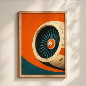 Puede incluir: Una impresión artística enmarcada que presenta una ilustración estilizada de un motor de avión. La obra de arte muestra las aspas del ventilador del motor en color turquesa, sobre un fondo naranja y turquesa vibrante. El motor está detallado con acentos beige y naranja.