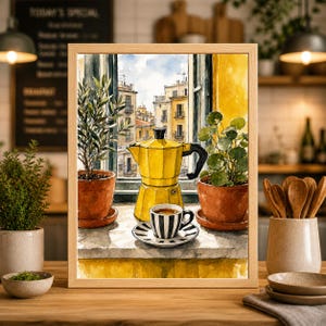 May include: Watercolor print of a yellow stovetop espresso maker, a cup of coffee, and potted plants on a windowsill. The scene is framed by a window overlooking a European cityscape. The artwork is in a wooden frame.
