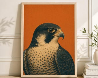 以下が含まれることがあります： ハヤブサのイラストが描かれた額入りのアートプリント。鳥は濃いグレーと白の羽、黄色のくちばし、鋭い視線を持っています。背景はオレンジ色で、フレームは明るい木の色です。