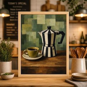 May include: A framed painting depicts a coffee scene. A black and white striped stovetop espresso maker and a cup of coffee on a saucer sit on a wooden table. The background features a green and white abstract design.