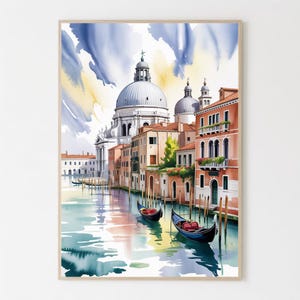 May include: Watercolor painting of Venice, Italy, featuring gondolas on a canal, buildings with red-tiled roofs, and a domed church. The sky has blue and yellow watercolor washes. The artwork is framed.