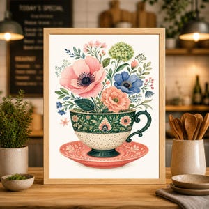 以下が含まれることがあります： 色とりどりの花で溢れるティーカップの額装水彩画。 ティーカップは緑色で花柄のデザインで、ピンク色のソーサーの上に置かれています。 花にはピンク、青、桃色の花が含まれており、鮮やかな花の配置を作り出しています。