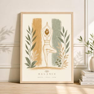 May include: A framed art print featuring a pencil sketch of a person in a yoga pose. The artwork has a neutral color palette with vertical stripes of gold and green. The word "BALANCE" is at the bottom, with the words "BREATH - FOCUS - GROW" below it.