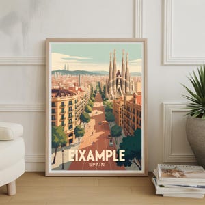 May include: A framed art print depicting a stylized illustration of Barcelona. The image shows the Sagrada Familia cathedral, a street with buildings, and the text "EIXAMPLE SPAIN". The colour scheme includes beige, brown, and green.