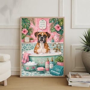 May include: A framed watercolor print featuring a Boxer dog in a vintage bathtub filled with bubbles. The artwork has a pink and teal color scheme with floral and tropical leaf accents. The words "Wash Soak Relax" are visible.