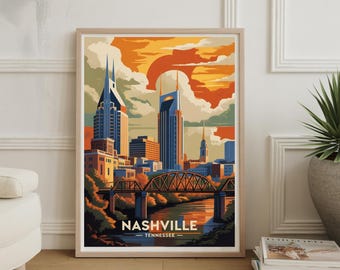 May include: A framed art print featuring a stylized illustration of the Nashville, Tennessee skyline. The artwork showcases buildings, a bridge, and a river, with a warm color palette of orange, blue, and yellow. The text "NASHVILLE - TENNESSEE" is at the bottom.