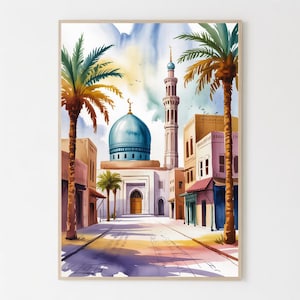 Może przedstawiać: Akwarela przedstawiająca krajobraz miejski Bliskiego Wschodu z meczetem z niebieską kopułą i minaretem. Palmy otaczają scenę uliczną z budynkami w odcieniach beżu, różu i błękitu. Grafika jest w drewnianej ramie.