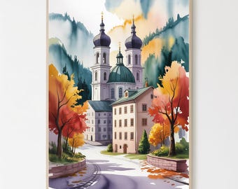 May include: Watercolor painting of a European town with a church featuring two black-domed towers and a green dome. The scene includes colorful autumn trees, buildings, and a road leading to the church. The artwork is framed.