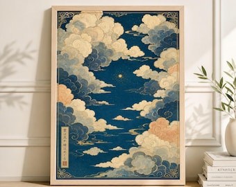 May include: A framed art print depicting stylized clouds in shades of blue, cream, and peach against a dark blue backdrop. The artwork has a Japanese aesthetic, with gold accents and text in the lower left corner. The print is in a light wood frame.