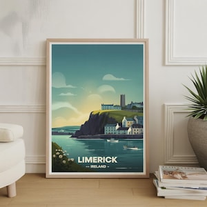 May include: A framed art print featuring a coastal scene of Limerick, Ireland. The artwork depicts a cliffside town with white buildings, a church tower, and boats on the water. The sky transitions from blue to yellow, with the text "LIMERICK -- IRELAND --" at the bottom.