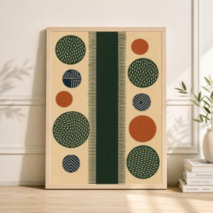 May include: Framed abstract art print featuring a beige background with a dark green vertical stripe and a series of circles in dark green, rust, and navy blue. The circles have various patterns, including dots and lines.