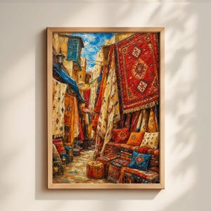 May include: A framed painting showing a bustling marketplace. The artwork features colourful rugs and textiles hanging from stalls, with pillows and carpets displayed below. The painting uses warm tones, with reds, oranges, and yellows, creating a vibrant bazaar atmosphere.