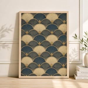 May include: A framed art print featuring a repeating fan-shaped pattern in navy blue, gray, and cream colors. Each fan shape has a gold fleur-de-lis accent. The artwork is displayed in a light wood frame.