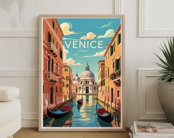 May include: A framed art print of Venice, Italy, featuring a canal scene with gondolas. The artwork showcases colorful buildings, a domed church, and the text "VENICE ITALY" against a blue sky with clouds. The print is in a light-colored wooden frame.