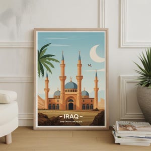May include: Framed art print featuring a stylized illustration of a mosque in Iraq. The artwork showcases a beige building with blue domes and minarets, set against a blue sky with a crescent moon and palm tree. Text at the bottom reads "- IRAQ - THE GREAT MOSQUE."