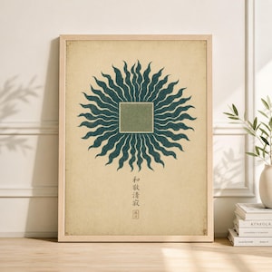 May include: Framed print with a teal sunburst design and a central green square on a beige background. Japanese characters are at the bottom. The print is in a light wooden frame. The artwork evokes a sense of calm and minimalist aesthetic.