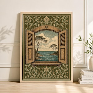 May include: A framed art print depicting a coastal scene viewed through an open window. The window has wooden shutters and a decorative frame with a green floral pattern. The scene shows trees, blue water, and a cloudy sky.