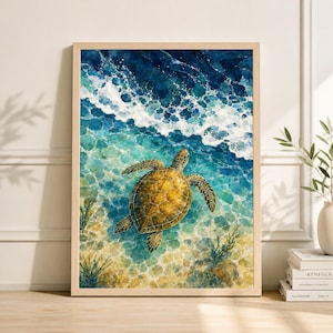 May include: A framed watercolour print showing a sea turtle in turquoise water. The artwork depicts the turtle from above, with detailed textures in its shell and the surrounding ocean. The waves are a deep blue, and the frame is light wood.