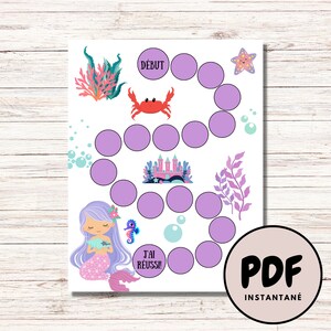 Può includere: Un tabellone di gioco stampabile a tema sirenetta con cerchi viola, un granchio, un castello, alghe e bolle. Il tabellone di gioco include il testo "Début" e "J'ai Réussi!"