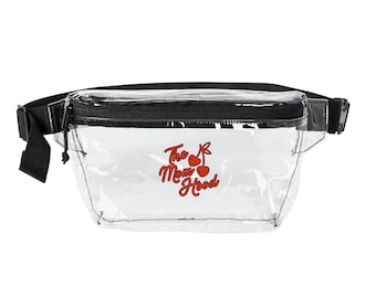 Riñonera transparente en blanco y negro con logo de The Mom Shed.