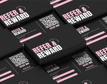 May include: A stack of black business cards with a pink and white logo that says "Refer & Reward". The cards have a QR code and the text "Scan me" on them. The text "Refer a friend and you both receive 20% off treatment!" is also on the cards.