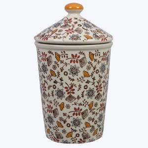 May include: A white ceramic canister with a floral pattern in shades of brown, red, yellow, and blue. The canister has a lid with a yellow knob.