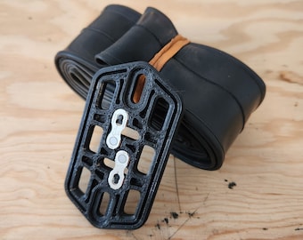 Placa portacámara de bicicleta con almacenamiento Quick Link fabricada con material reciclado