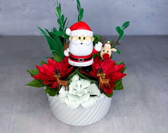 Santa from Rudolph the Red-Nosed Reindeer Figure in Paper Flower Succulent and Poinsettia Pot