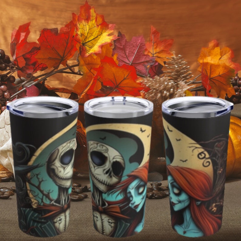 May include: Three stainless steel tumblers with a black background and a colorful image of Jack Skellington and Sally from the Nightmare Before Christmas movie. The tumblers are a great way to show your love for the movie.