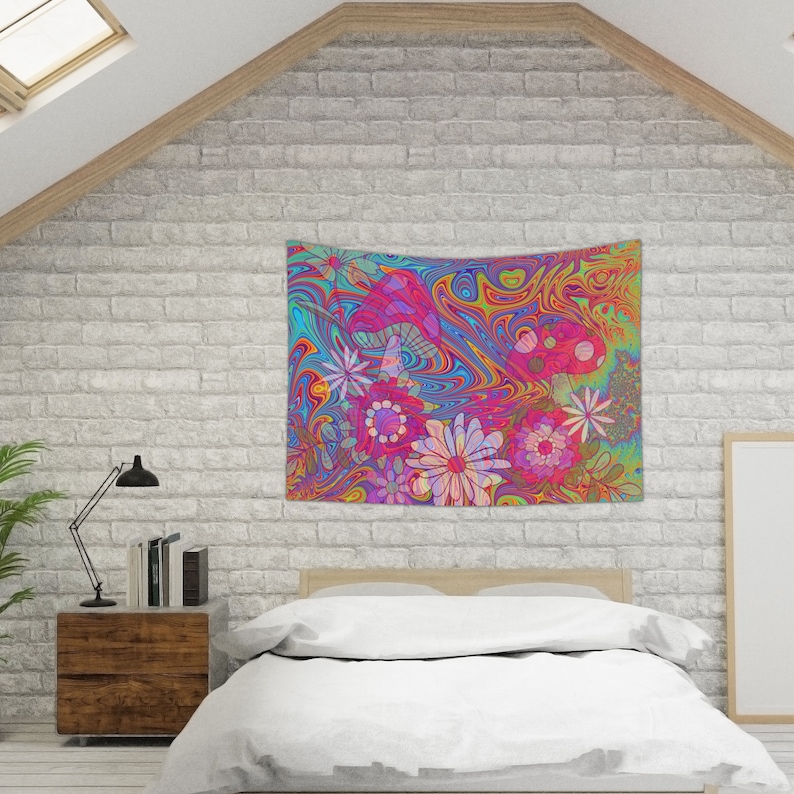 May include: A psychedelic tapestry featuring a swirling, abstract background in shades of blue, yellow, and orange. The background is adorned with pink, red, and white flowers and mushrooms.