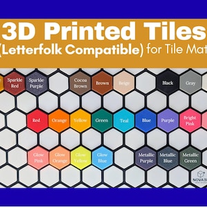 May include: A grid of colorful 3D printed tiles in various colors, including red, orange, yellow, green, and blue. The tiles are hexagonal and labeled with color names. Text at the top reads "3D Printed Tiles (Letterfolk Compatible) for Tile Mat."