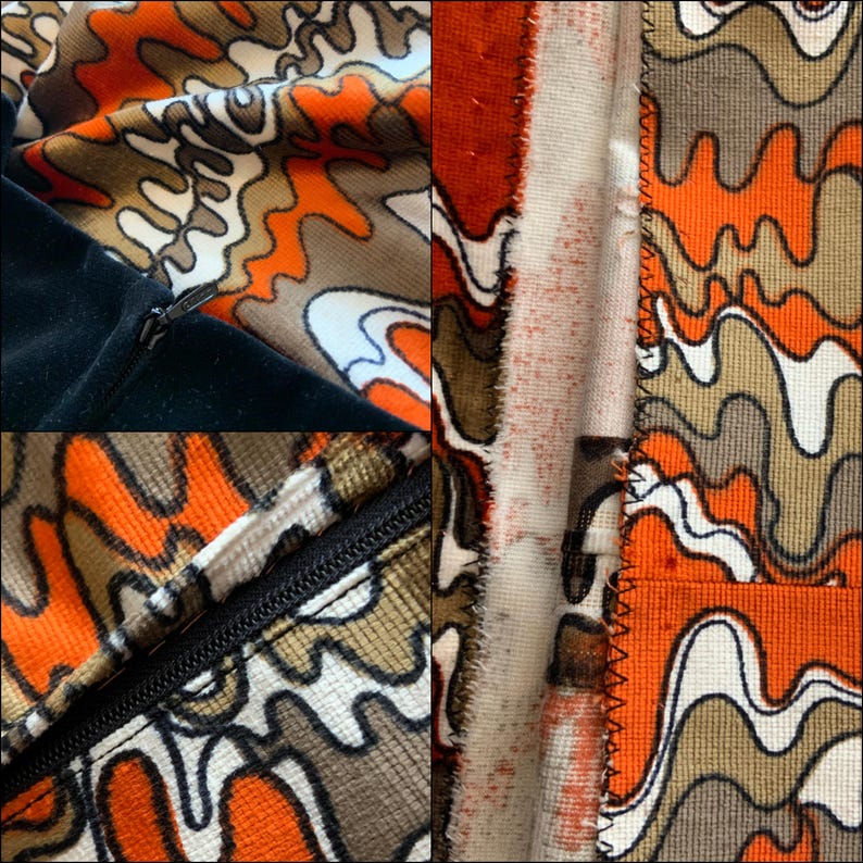 May include: Close-up of a zipper on a black and orange fabric with a wavy pattern. The fabric is sewn together with a zig-zag stitch.