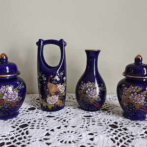 A set of four Blue Japanese Porcelain Jar, Vase and  pink floral cart