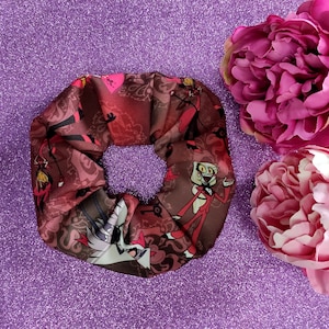 Miękkie, elastyczne postacie Scrunchie z motywem Hazbin Hotel