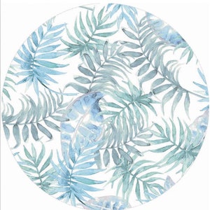 May include: A watercolor pattern of blue and green tropical leaves on a white background. The leaves are arranged in a circular pattern.