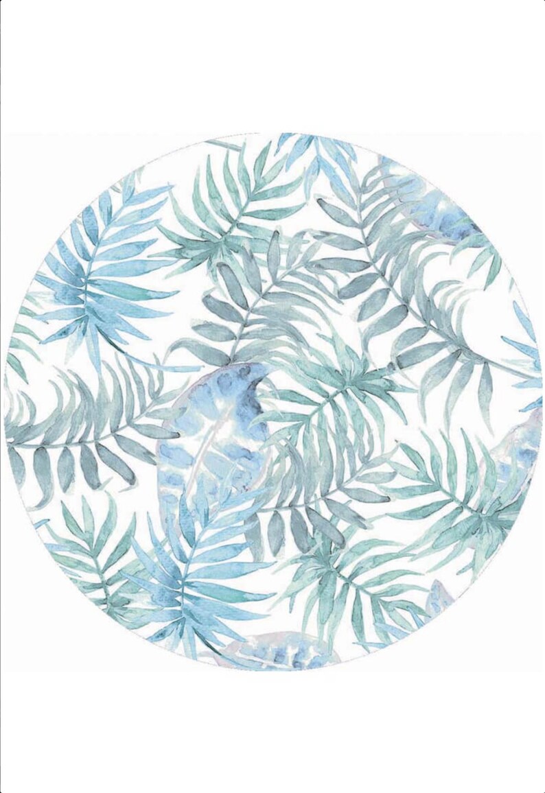 May include: A watercolor pattern of blue and green tropical leaves on a white background. The leaves are arranged in a circular pattern.