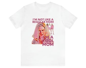 Könnte beinhalten: Weißes T-Shirt mit einer pinkfarbenen Grafik einer Frau mit blonden Haaren und dem Text "Ich bin nicht wie eine normale Mutter Ich bin eine coole Mutter".