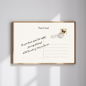 May include: A framed postcard with the words "Post Card" at the top. The postcard has handwritten text: "Do you think about the nights Sharing Whitney? With the end of July in the air." A butterfly stamp and postal markings are visible.