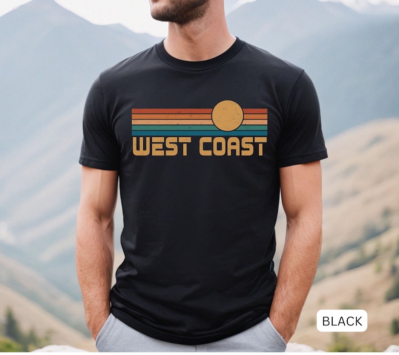 May include: A black t-shirt with a retro sunset graphic and the text "WEST COAST" in yellow.