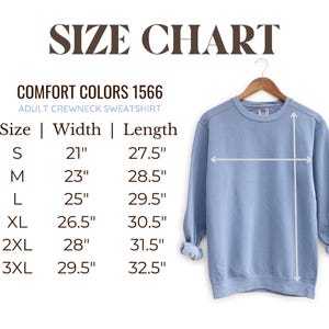 May include: Size chart for adult crewneck sweatshirts in Comfort Colors 1566. The chart shows sizes S through 3XL with corresponding width and length measurements in inches.