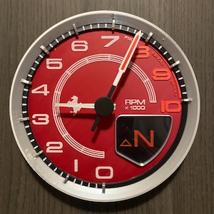 Orologio da parete ispirato al tachimetro della Ferrari 458 - Eleganza e velocità a portata di mano