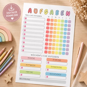 May include: A white task planner sheet with the German title AUFGABEN in colorful letters. It features a section for TÄGLICHE AUFGABEN with checkboxes and a rainbow-colored grid, plus a WÖCHENTLICHE AUFGABEN section for days of the week.