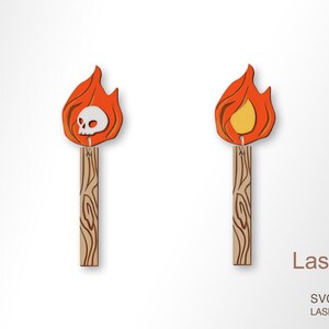 May include: A pair of wooden earrings shaped like torches with orange flames. One torch features a white skull, the other a yellow flame center. The wooden handles have a wood grain pattern. The earrings are designed by LaserArtist studio.