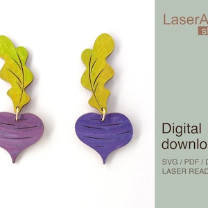 May include: A pair of laser-cut wooden earrings shaped like purple turnips with green leaves. The earrings are digital downloads in SVG, PDF, and DXF formats, ready for laser cutting.
