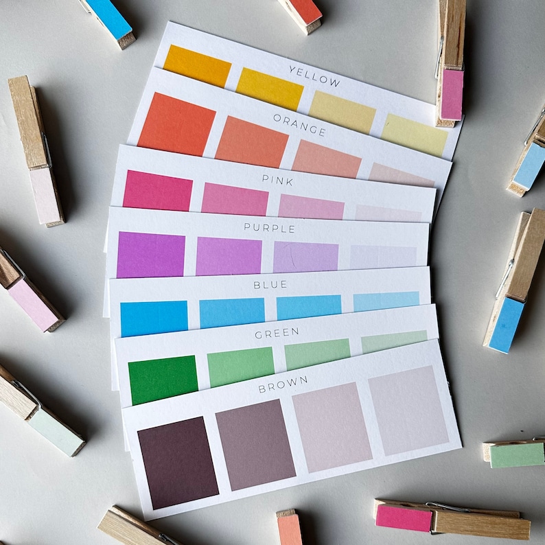 May include: A set of color swatches with the names of each color printed on the cards. The colors are yellow, orange, pink, purple, blue, green, brown, and gray.