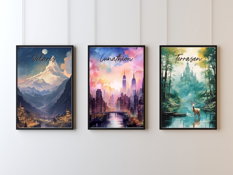 May include: Three framed prints with watercolor-style illustrations. The first print features a snowy mountain range with a town at the base and the text "Velaris". The second print features a city skyline with a bridge and the text "Lunathion". The third print features a forest with a castle in the distance, a deer standing in a lake, and the text "Terrasen".