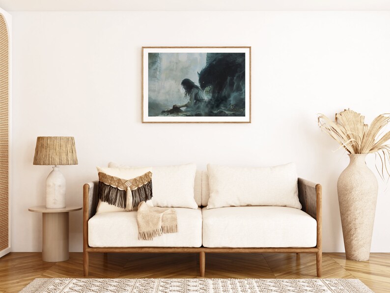May include: A framed painting depicting a woman in a white dress kneeling before a shadowy figure. The artwork is displayed on a white wall in a living room featuring a sofa, a lamp, and a vase of dried flowers.