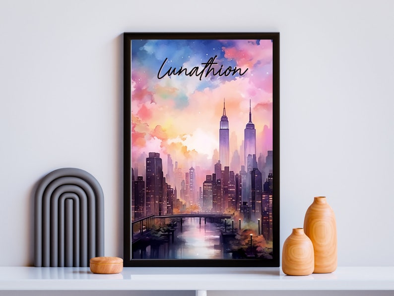 May include: A watercolor painting of a city skyline with a pink, orange, and purple sunset. The painting is framed in black and has the word "Lunathion" written in black cursive at the top.