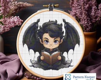 May include: Cross-stitch pattern of a cartoon character with black wings, black hair, and a book in their hands. The character is wearing a black robe and is sitting on a cloud. The pattern is in a white hoop and is compatible with Pattern Keeper.