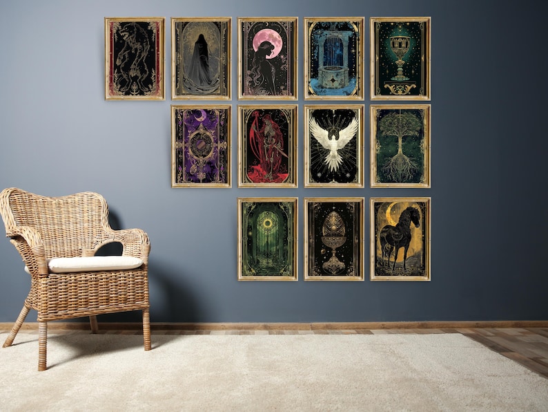 May include: A collection of framed art prints with mystical and gothic themes. Each print features detailed illustrations in dark colors, including figures, celestial bodies, and symbolic imagery. The prints are displayed on a blue wall.